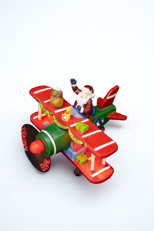 20.5cm Musical Light-Up Santa Airplane – Animated Christmas Decoration with Gifts & LED 'MERRY' Propeller